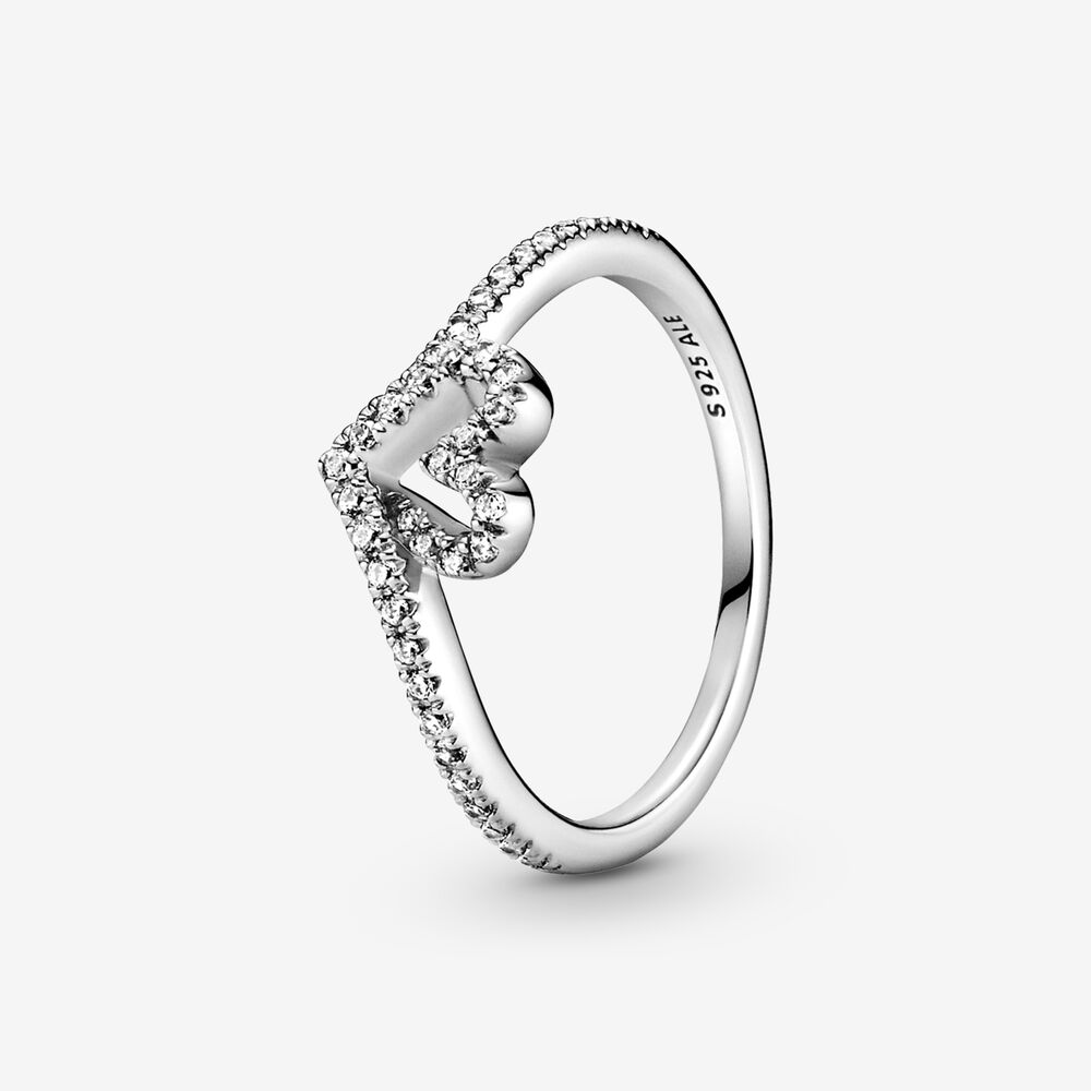 Gift the one you love the Sparkling Wishbone Heart Ring. Hand-finished in sterling silver, this piece is inspired by classic Pandora design elements and clear cubic zirconia decorate the heart and top of the ring shank