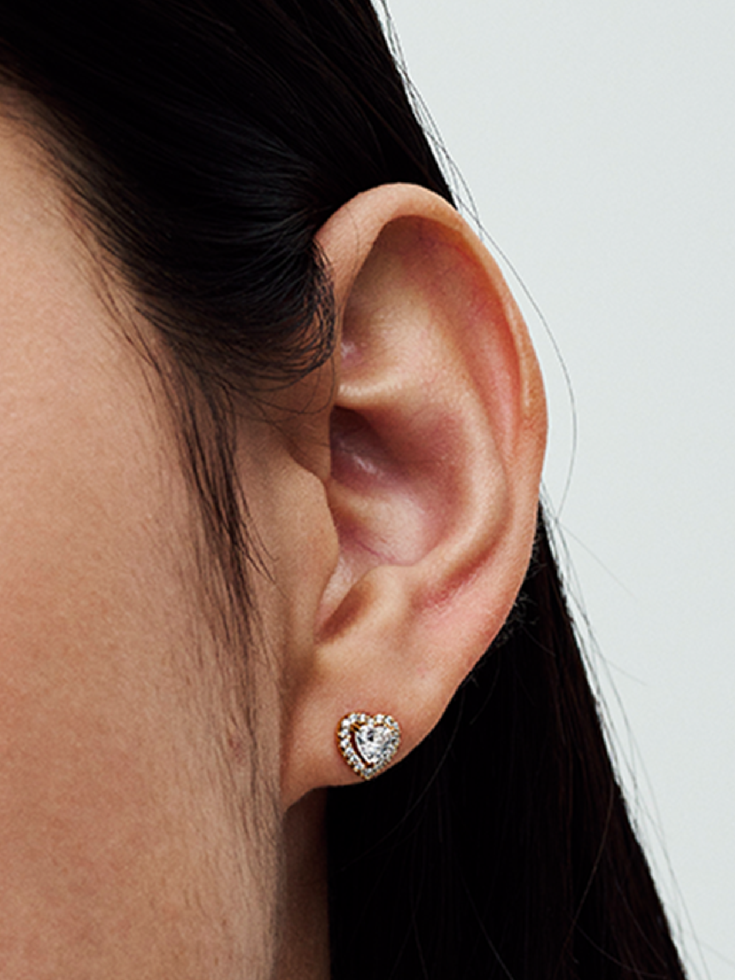 Sparkling Elevated Heart Stud Earrings | Gold plated | Pandora US