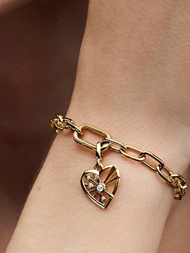 FINAL SALE - Heart & Rays Medallion Charm