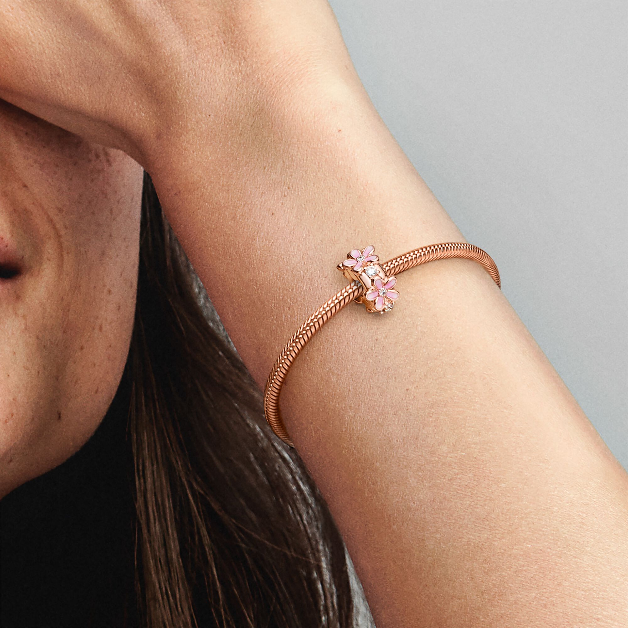 Pink Daisy Spacer Clip Charm | Rose gold plated | Pandora US