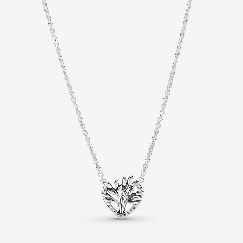 A luxury necklace made of silver is decorated with this openwork heart-shaped pendant with sparkling clear stones that would make a perfect gift.