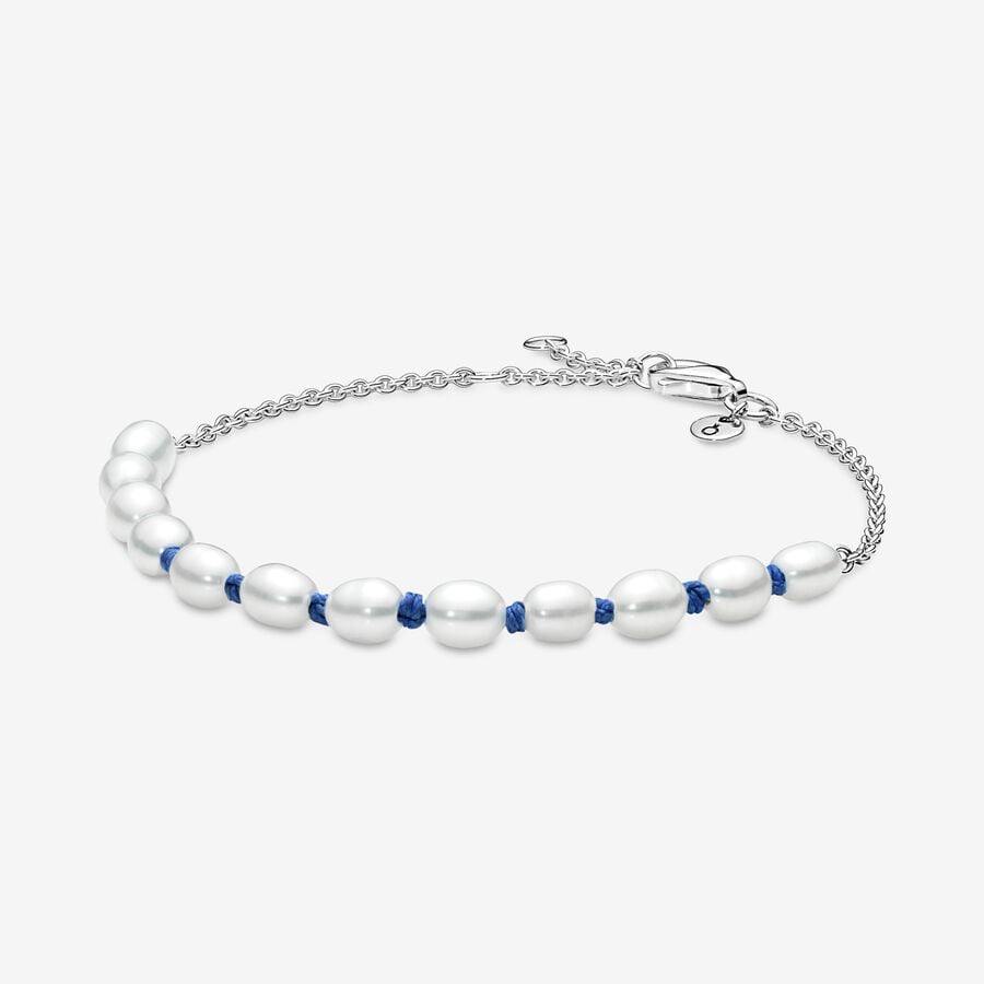 FINAL SALE - Treated Freshwater Cultured Pearl Blue Cord Chain Bracelet image number 0